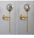 Glass Torch Wall Light in Brass