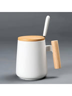 Keramische Kaffeetasse mit Holzgriff