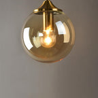 Glass Torch Wall Light in Brass